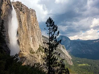 View of Upper Yosemite Fall and Half Dome from trail