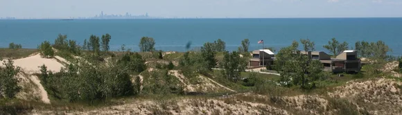 Overview of West Beach bathhouse from trail.